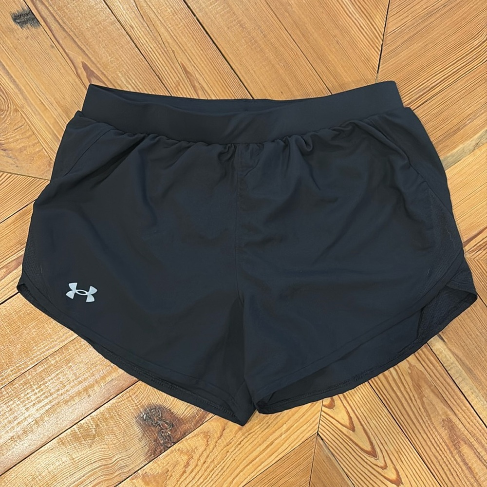 Women’s Under Armour heat gear shorts in medium